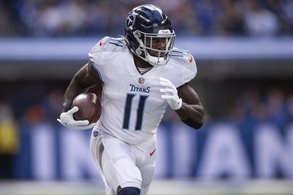 FILE - Tennessee Titans wide receiver A.J. Brown (11) turns upfield after a catch on the way to a 57-yard touchdown during an NFL football game against the Indianapolis Colts on Oct. 31, 2021, in Indianapolis. The Titans traded Brown to the Philadelphia Eagles to move up to No. 18 overall and selected Arkansas' Treylon Burks as his replacement. (AP Photo/Zach Bolinger, File)