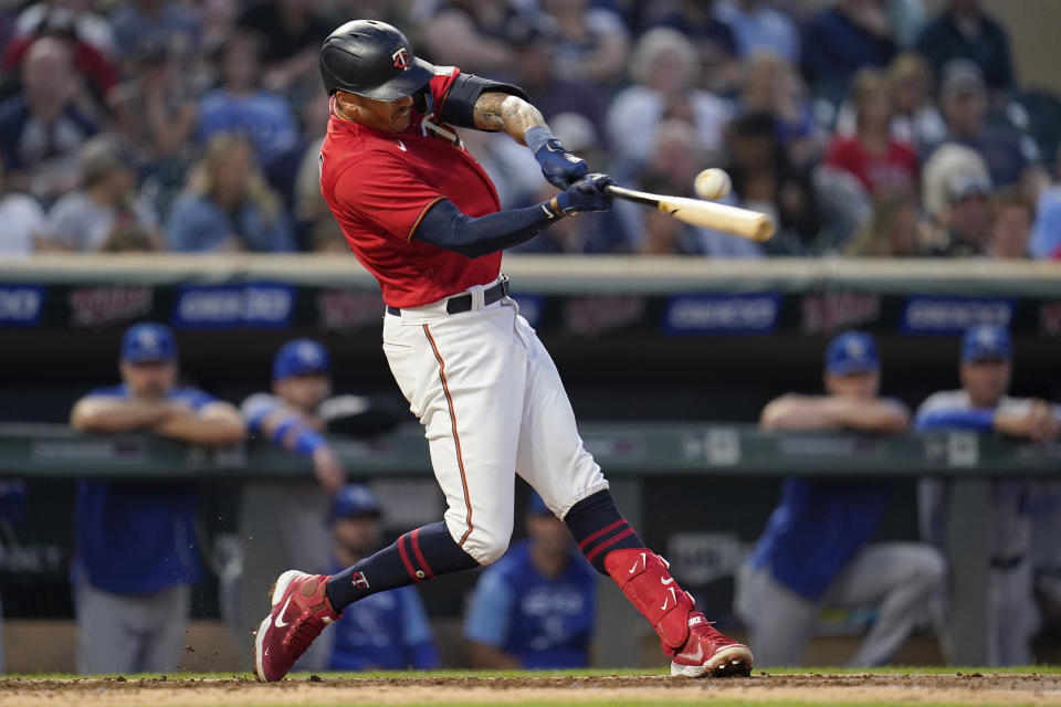 FILE - Minnesota Twins' Carlos Correa hits an RBI double during the third inning of a baseball game against the Kansas City Royals, Tuesday, Sept. 13, 2022, in Minneapolis. In a wild twist overnight, Carlos Correa agreed to a $315 million, 12-year contract with the free-spending New York Mets after his pending deal with the San Francisco Giants came apart over an issue with his physical. (AP Photo/Abbie Parr, File)