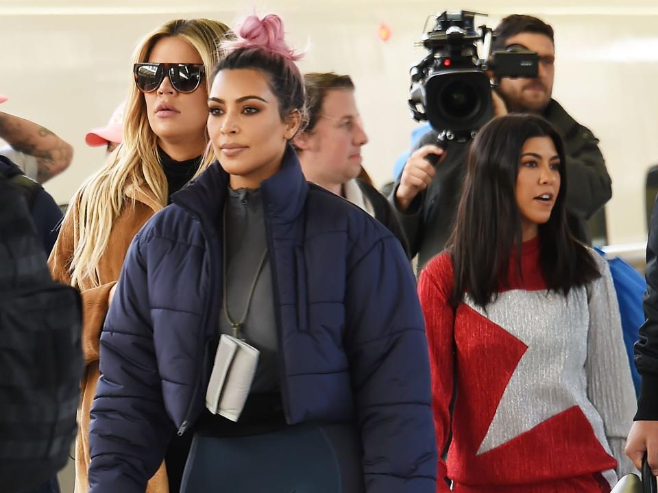 Kim Kardashian, Kourtney Kardashian, and Khloe Kardashian on March 2, 2018 in Tokyo, Japan.