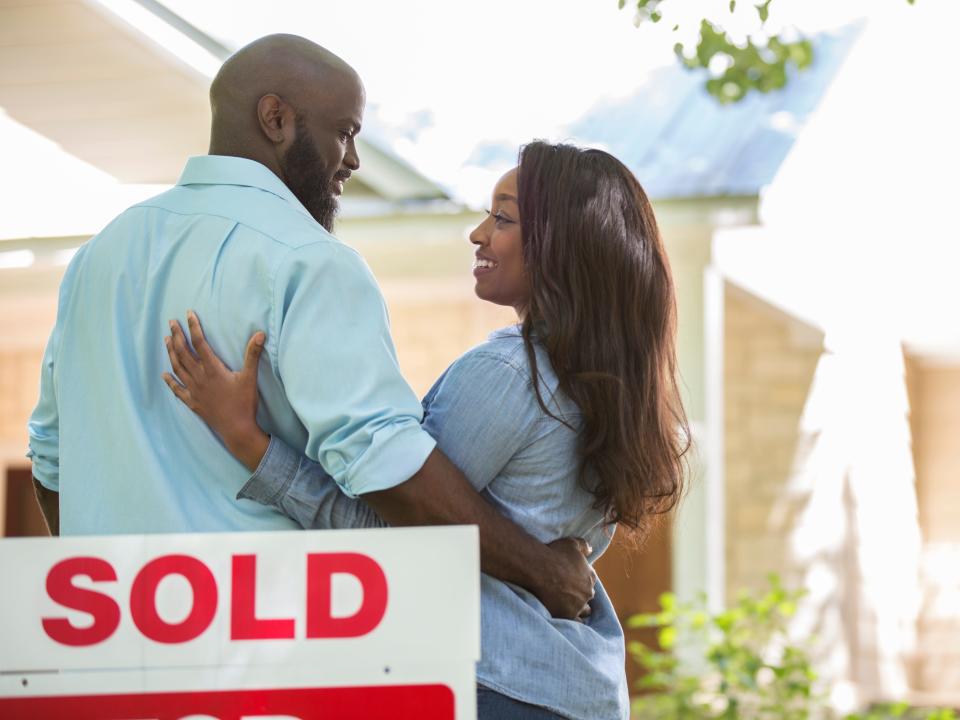 A couple moving into a new home.