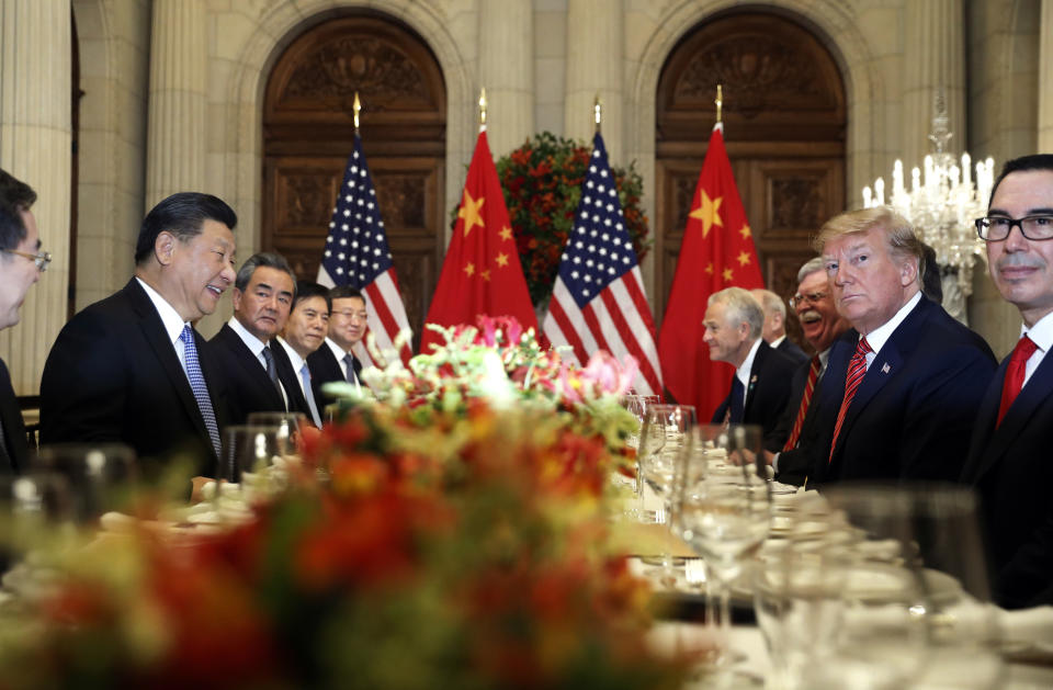 FILE - In this Dec. 1, 2018, file photo, U.S. President Donald Trump, second right, and China's President Xi Jinping, second left, attend their bilateral meeting at the G20 Summit in Buenos Aires, Argentina. A U.S.-Chinese cease fire on tariffs gives jittery companies a respite but does little to resolve a war over Beijing's technology ambitions that threatens to chill global economic growth. (AP Photo/Pablo Martinez Monsivais, File)