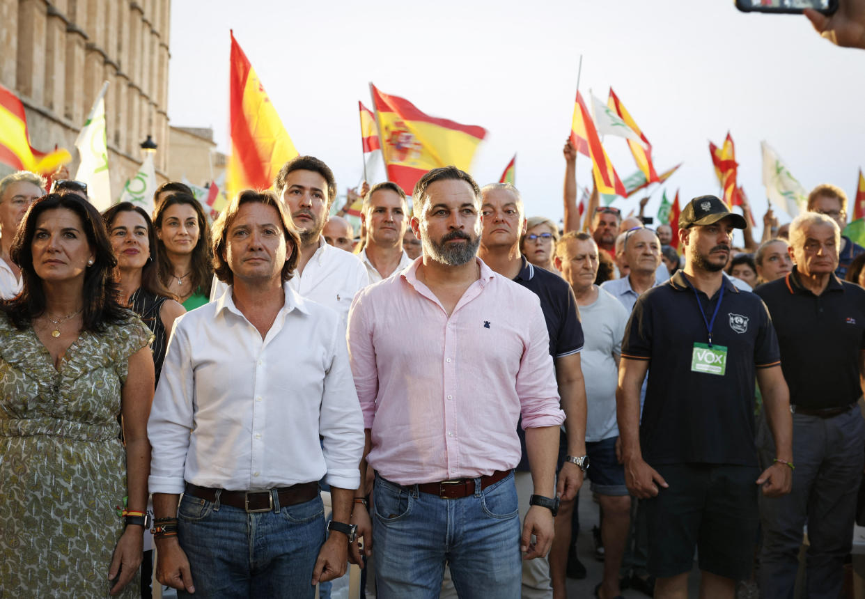 Vox party leader Santiago Abascal, center, listens to the national anthem during a campaign event in Palma de Mallorca on July 14, 2023. (Jaime Reina / AFP - Getty Images)