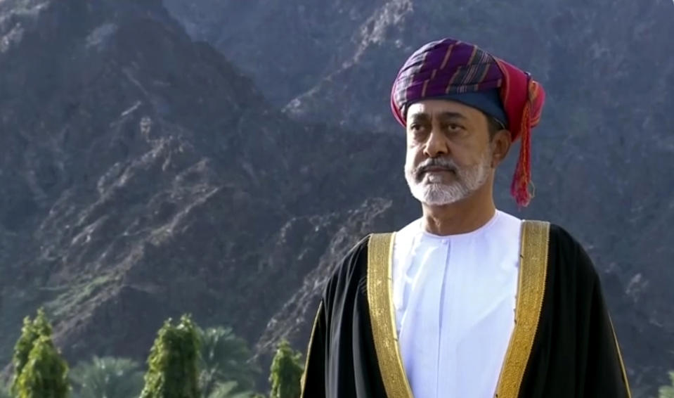 This image made from video shows Oman's new sultan Haitham bin Tariq Al Said, takes part in canon firing salute ceremony outside the Royal Family Council in Muscat, Oman, Saturday, Jan. 11, 2020. Sultan Qaboos bin Said, the Mideast's longest-ruling monarch who seized power in a 1970 palace coup and pulled his Arabian sultanate into modernity while carefully balancing diplomatic ties between adversaries Iran and the U.S., has died. He was 79. (Oman TV via AP)