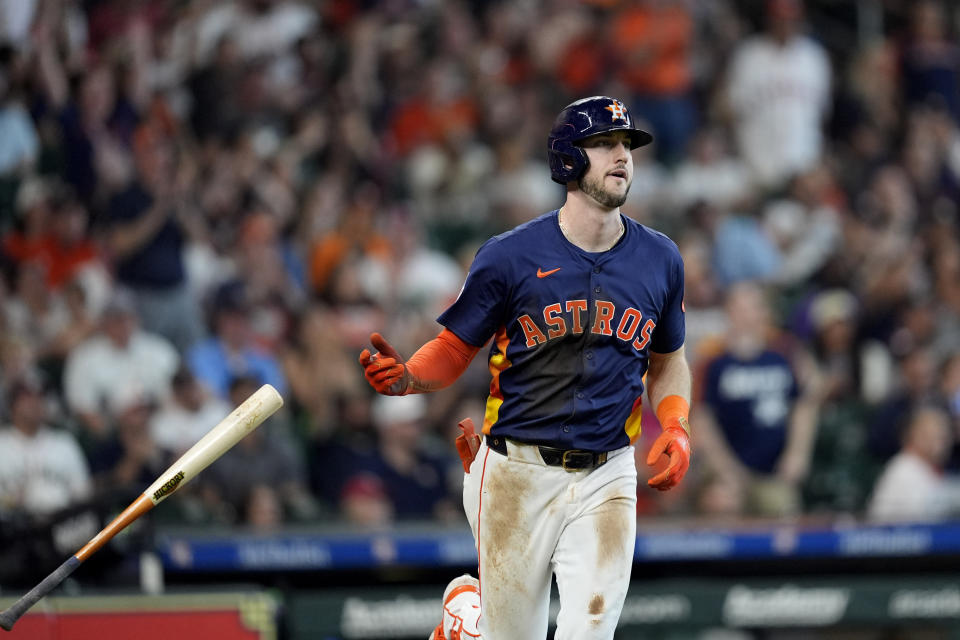 Houston Astros' Kyle Tucker tosses his bat after hitting a home run against the Minnesota Twins during the third inning of a baseball game Saturday, June 1, 2024, in Houston. (AP Photo/David J. Phillip)