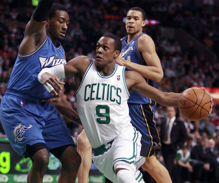 Rajon Rondo y John Wall en un partido de la NBA en 2011, eran estrellas de Boston y Washington
