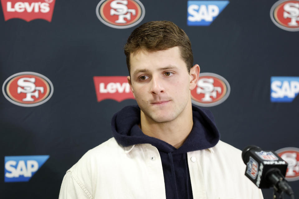 San Francisco 49ers quarterback Brock Purdy speaks to reporters after an NFL football game against the Cleveland Browns Sunday, Oct. 15, 2023, in Cleveland. (AP Photo/Ron Schwane)