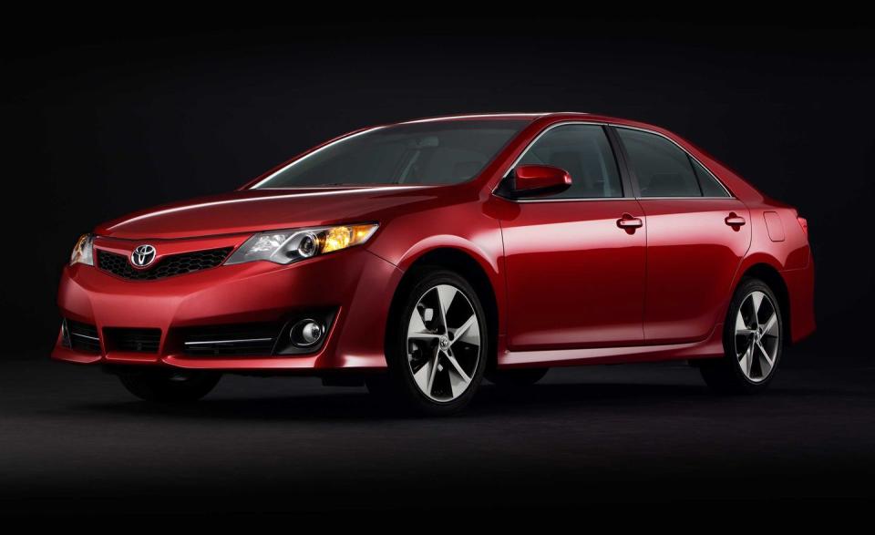 <p><a rel="nofollow noopener" href="https://www.caranddriver.com/reviews/2012-toyota-camry-first-drive-review" target="_blank" data-ylk="slk:The Camry's total redesign;elm:context_link;itc:0;sec:content-canvas" class="link ">The Camry's total redesign</a> proves to be a powerful sales booster, with 2012 volumes eclipsing 2011 volumes by nearly 100,000 units. Nevertheless, the Camry continues its finishing-order streak in <em>Car and Driver</em> comparison tests, <a rel="nofollow noopener" href="https://www.caranddriver.com/reviews/2013-chevrolet-malibu-eco-vs-2012-honda-accord-ex-l-2012-hyundai-sonata-se-2012-kia-optima-ex-2012-toyota-camry-se-2012-volkswagen-passat-25-se-comparison-tests" target="_blank" data-ylk="slk:placing fifth in another six-car showdown;elm:context_link;itc:0;sec:content-canvas" class="link ">placing fifth in another six-car showdown</a>.</p>