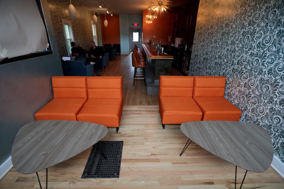 A seating area provides a spot for sipping a cocktail at Lost Whale in Bay View.