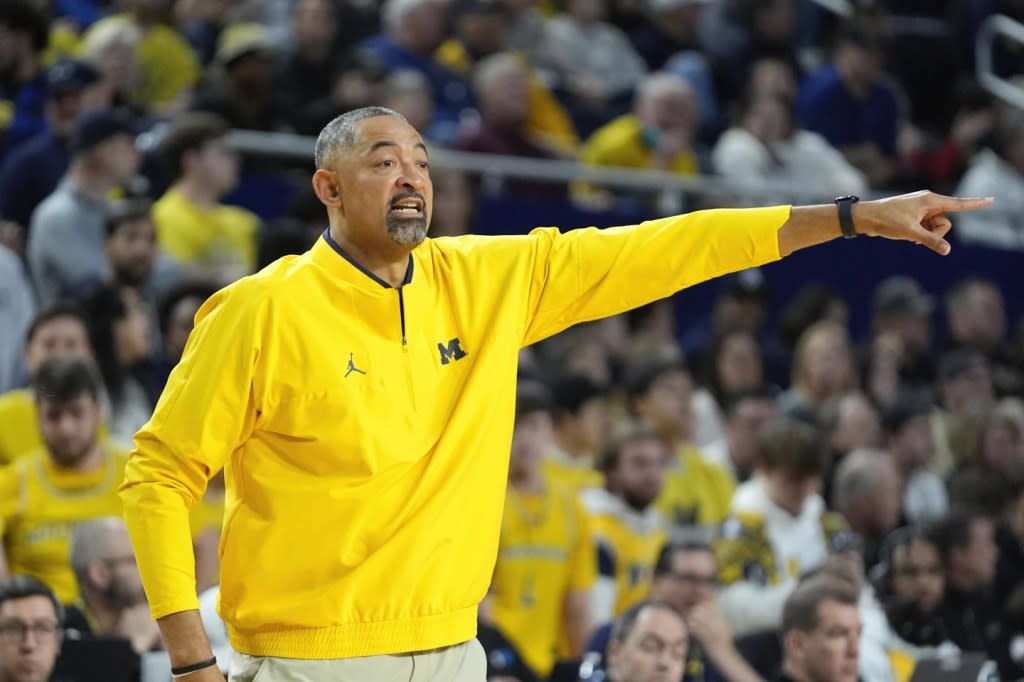 Michigan head coach Juwan Howard watches against Purdue in the first half of an NCAA college basketball game in Ann Arbor, Mich., Sunday, Feb. 25, 2024. (AP Photo/Paul Sancya)