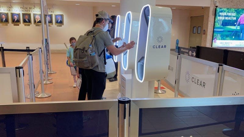 Passengers using CLEAR kiosk that allows quick and secure Identity confirmation, West Palm Beach Airport, Florida