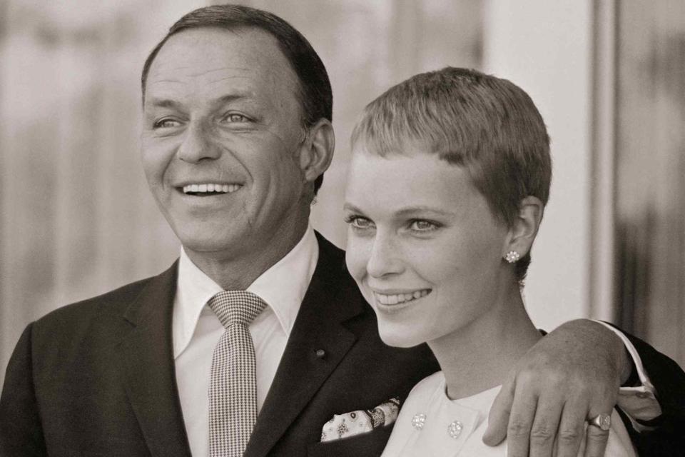 <p>Bettmann</p> Frank Sinatra and Mia Farrow following their wedding in Las Vegas on July 19, 1966.