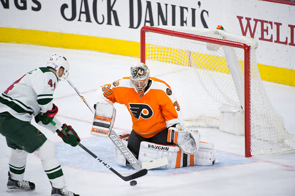 PHILADELPHIA, PA - NOVEMBER 12: Philadelphia Flyers Goalie Michal Neuvirth (30) makes a save on Minnesota Wild Center Tyler Graovac (44) in the first period during the game between the Minnesota Wild and the Philadelphia Flyers on November 12, 2016 at the Wells Fargo Center in Philadelphia, PA. (Photo by Kyle Ross/Icon Sportswire via Getty Images)