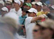 Rory McIlroy of Northern Ireland hits off the eighth tee during first round play of the Masters golf tournament at the Augusta National Golf Course in Augusta, Georgia April 9, 2015. REUTERS/Phil Noble