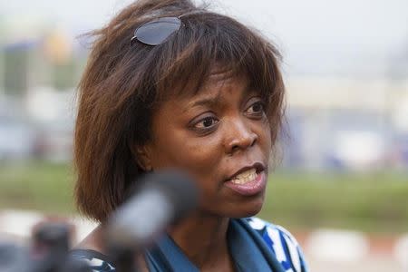 Executive Director of the United Nations World Food Programme, Ertharin Cousin, addresses the media on her arrival at the airport of the capital Bangui March 18, 2014. REUTERS/Siegfried Modola