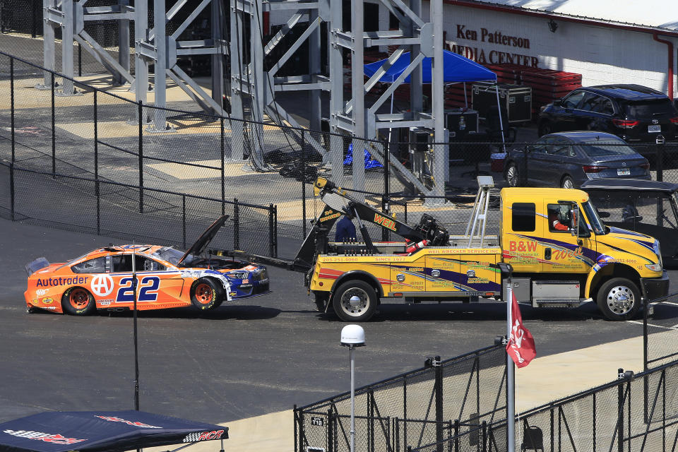 TALLADEGA, AL - APRIL 25: #22: Joey Logano, Team Penske, Ford Mustang Autotrader is pulled to the garage on a tow truck after a wreck during the running of the 52nd Annual Geico 500 NASCAR Cup Series race on April 25, 2021 at the Talladega Superspeedway in Talladega, Alabama.  (Photo by David J. Griffin/Icon Sportswire via Getty Images)