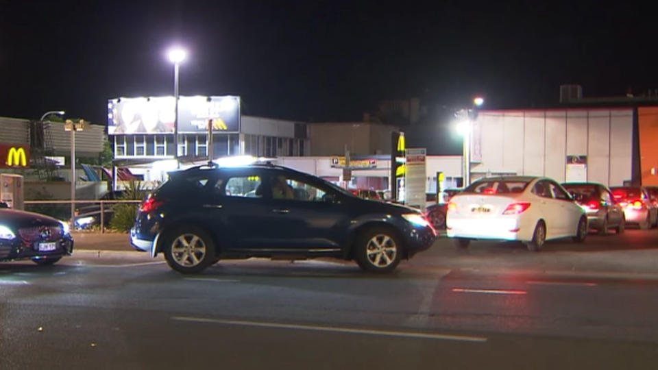 Cars lined up a McDonald's on Hindley Street in Adelaide.