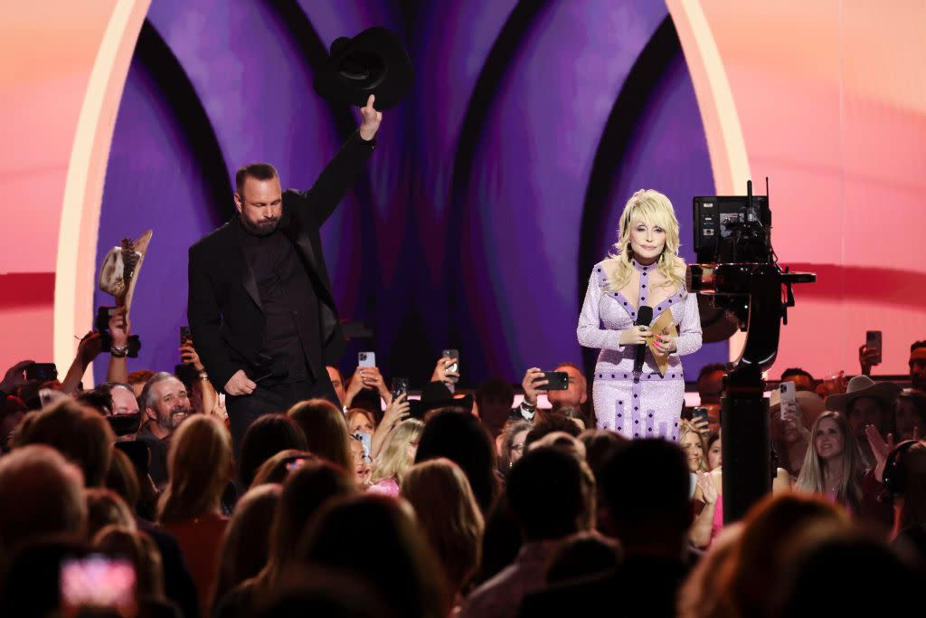 frisco, texas may 11 l r co hosts garth brooks and dolly parton speak onstage during the 58th academy of country music awards at the ford center at the star on may 11, 2023 in frisco, texas photo by theo wargogetty images