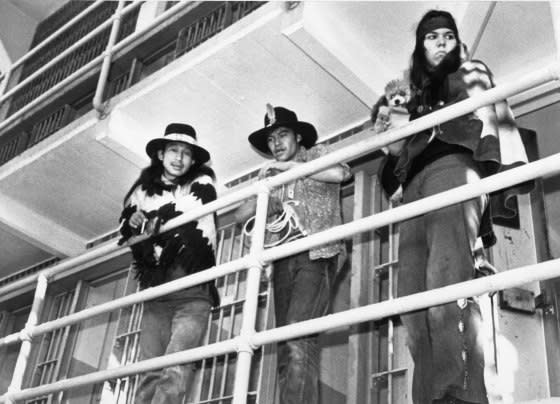 Indian demonstrators inspect prison galleries in the main cell block on Alcatraz Island on Nov. 20, 1969.<span class="copyright">Bettmann Archive/Getty Images</span>
