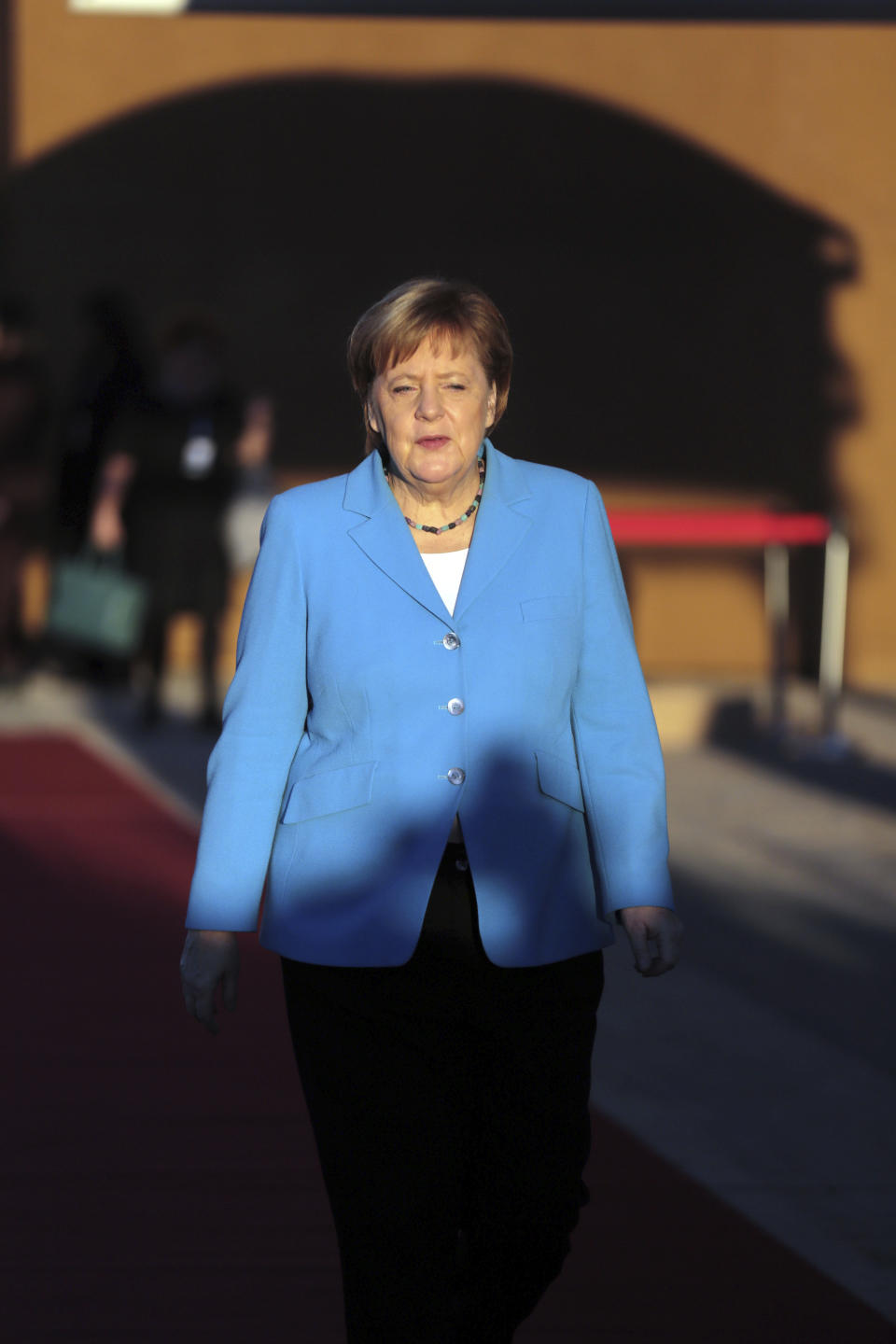 German Chancellor Angela Merkel arrives to attend a UN Migration Conference in Marrakech, Morocco, Monday, Dec.10, 2018. Top U.N. officials and government leaders from about 150 countries are uniting around an agreement on migration, while finding themselves on the defensive about the non-binding deal amid criticism and a walkout from the United States and some other countries. (AP Photo/Mosa'ab Elshamy)