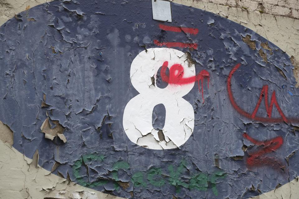 Paint peels at the Akron Rubber Bowl.