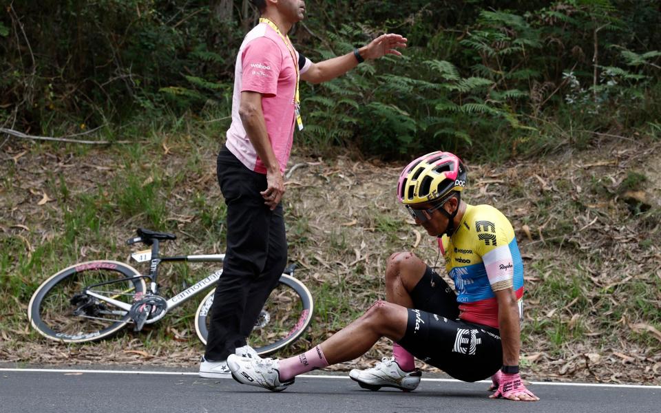 EF Education-EasyPost's Richard Carapaz reacts after taking a fall and sustaining an injury during stage 1