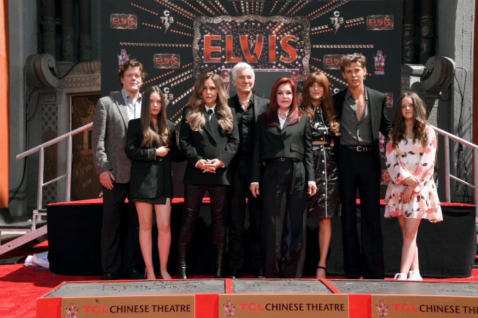 Butler alongside Baz Luhrmann and members of the Presley family (Getty Images)