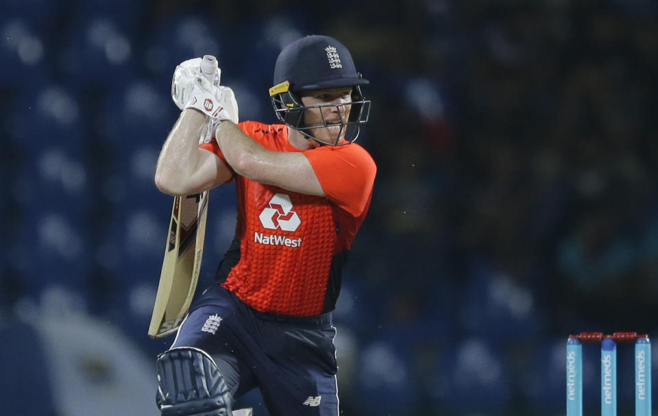 England's Eoin Morgan plays a shot during their third one-day international cricket match with Sri Lanka in Pallekele, Sri Lanka, Wednesday, Oct. 17, 2018. (AP Photo/Eranga Jayawardena)