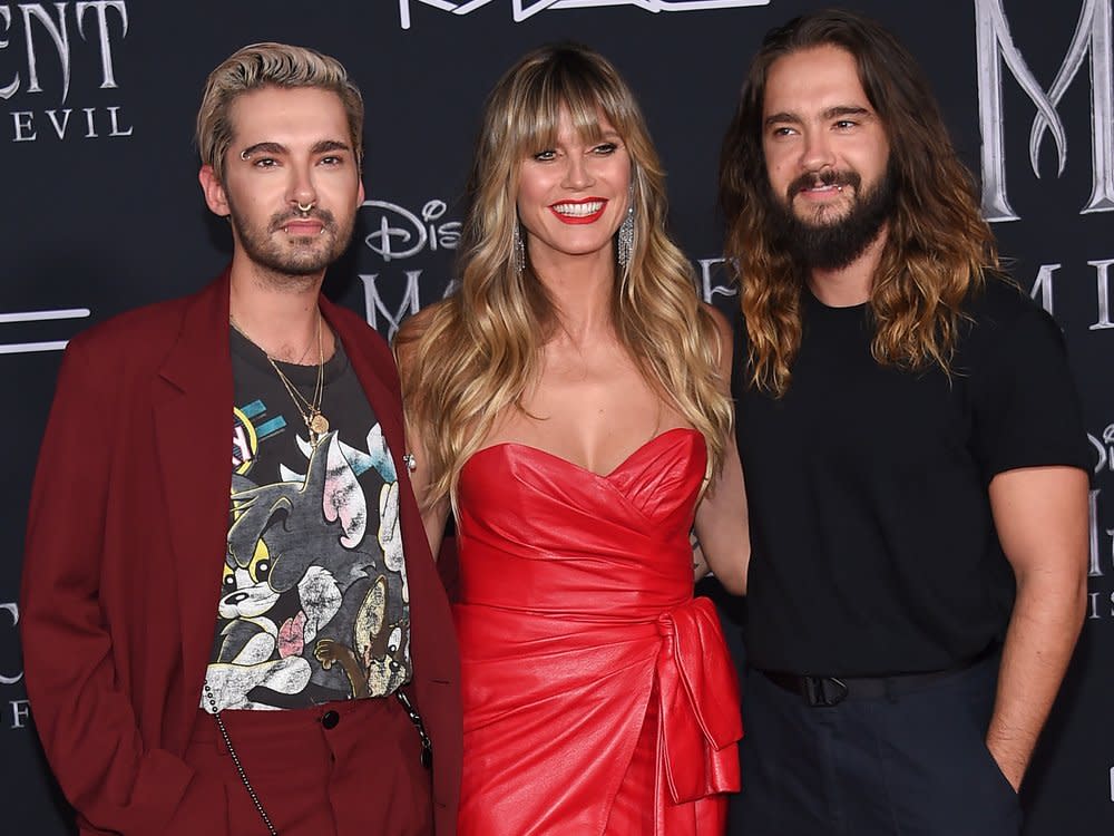 Bill Kaulitz (li.) zusammen mit Heidi Klum und deren Ehemann Tom Kaulitz. (Bild: DFree/Shutterstock)