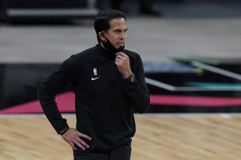 Miami Heat Erik Spoelstra talks to his players during the second half of an NBA basketball game against the San Antonio Spurs in San Antonio, Wednesday, April 21, 2021. (AP Photo/Eric Gay)