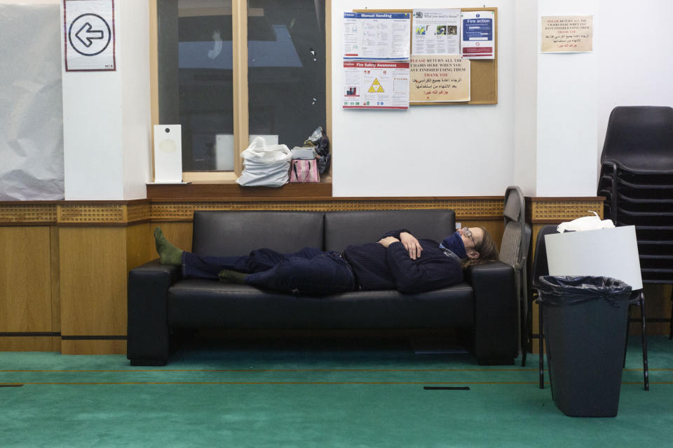 Ross Williamson, from Northenden in Manchester, takes refuge inside Didsbury Mosque after being told to evacuate on Wednesday night.