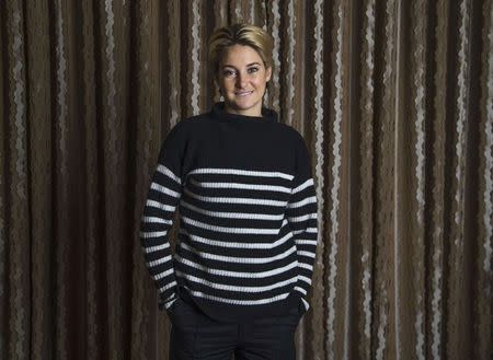 Actress Shailene Woodley poses for a portrait while promoting the upcoming movie "White Bird in a Blizzard" in Los Angeles, California October 20, 2014. REUTERS/Mario Anzuoni