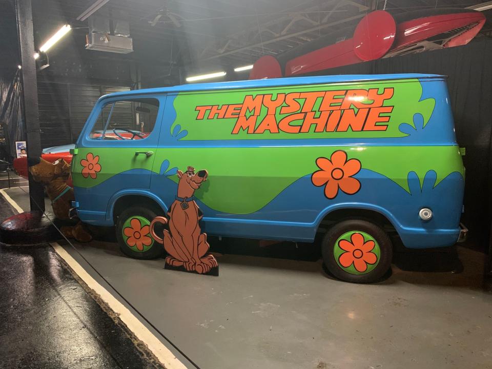 <img src="mystery-machine.jpg" alt="A replica of the Mystery Machine">