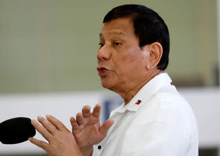 President Rodrigo Duterte gestures during a news conference before his departure to Da Nang in Vietnam, for the Asia Pacific Economic Cooperation (APEC) summit, at Ninoy Aquino International Airport in Pasay, metro Manila, Philippines November 8, 2017. REUTERS/Dondi Tawatao