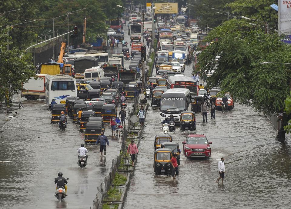 Mumbai: Vehicles move on waterlogged LBS road after heavy monsoon rain, at Kurla in Mumbai, Wednesday, Sept. 23, 2020. (PTI Photo/Kunal Patil)(PTI23-09-2020_000073B)