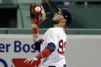 Boston Red Sox's Alex Verdugo makes the catch on the line out by Toronto Blue Jays' Bo Bichette during the third inning of a baseball game, Saturday, Aug. 8, 2020, in Boston. (AP Photo/Michael Dwyer)