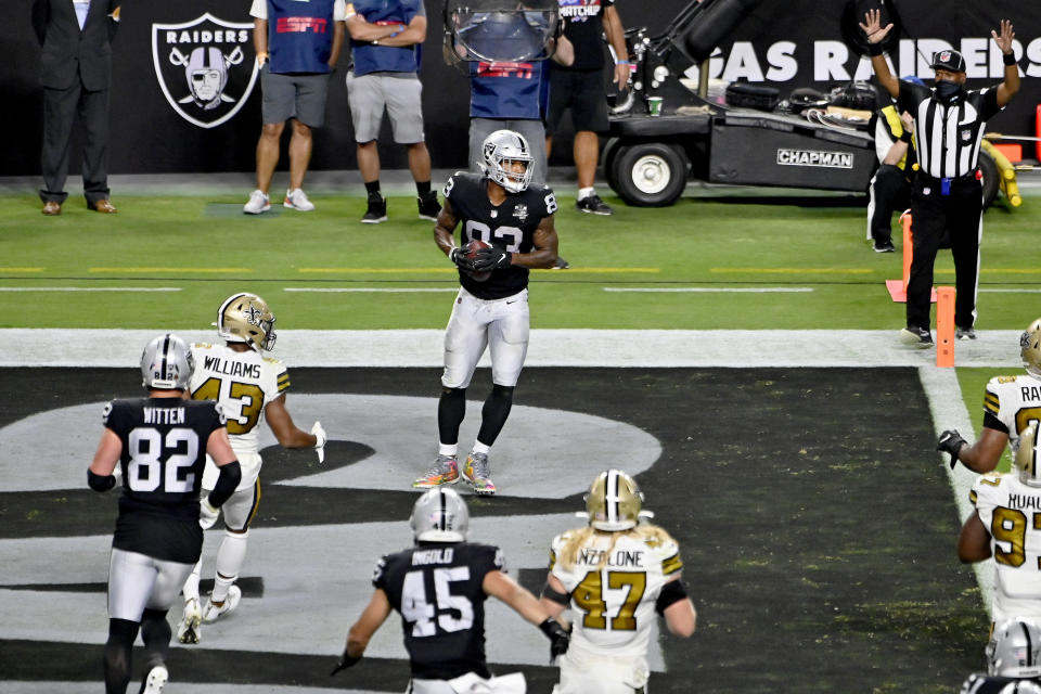 Las Vegas Raiders tight end Darren Waller (83) celebrates after catching a touchdown pass against the New Orleans Saints during the second half of an NFL football game, Monday, Sept. 21, 2020, in Las Vegas. (AP Photo/David Becker)