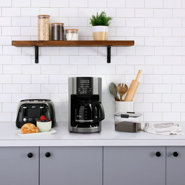 the black coffee maker in a kitchen