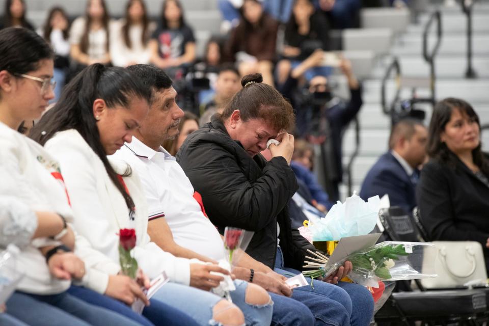 Margarita Flores Gutierrez cries in memory of her 17-year-old son, Miguel Romero, during a memorial for the teen at Horizon High School on Tuesday. Romero was killed in a hit-and-run in Horizon City.
