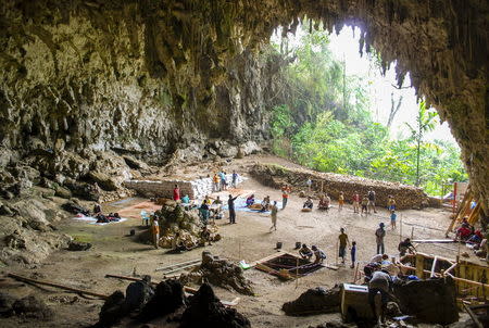 Archaeological excavations of Holocene deposits at Liang Bua on the Indonesian island of Flores are seen in progress in this undated handout picture courtesy of the Liang Bua Team. REUTERS/Liang Bua Team/Handout via Reuters