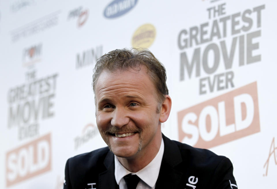 FILE - Filmmaker Morgan Spurlock arrives at the premiere of "Pom Wonderful Presents: The Greatest Movie Ever Sold" in Los Angeles on Wednesday, April 20, 2011. Spurlock, an Oscar-nominee who made food and American diets his life’s work, famously eating only at McDonald’s for a month to illustrate the dangers of a fast-food diet, has died. He was 53. (AP Photo/Matt Sayles, File)
