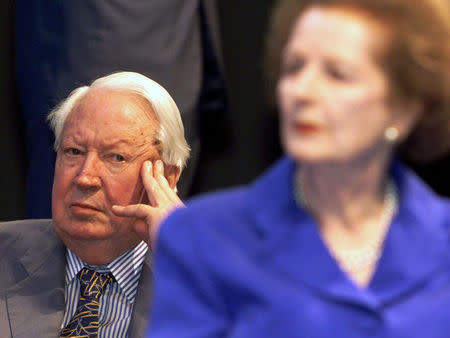 Former Prime Ministers Lady Thatcher and Edward Heath listen to speeches at the 115th Conservative Party conference in Bournemouth in this file photograph dated October 7, 1998. REUTERS/Dylan Martinez