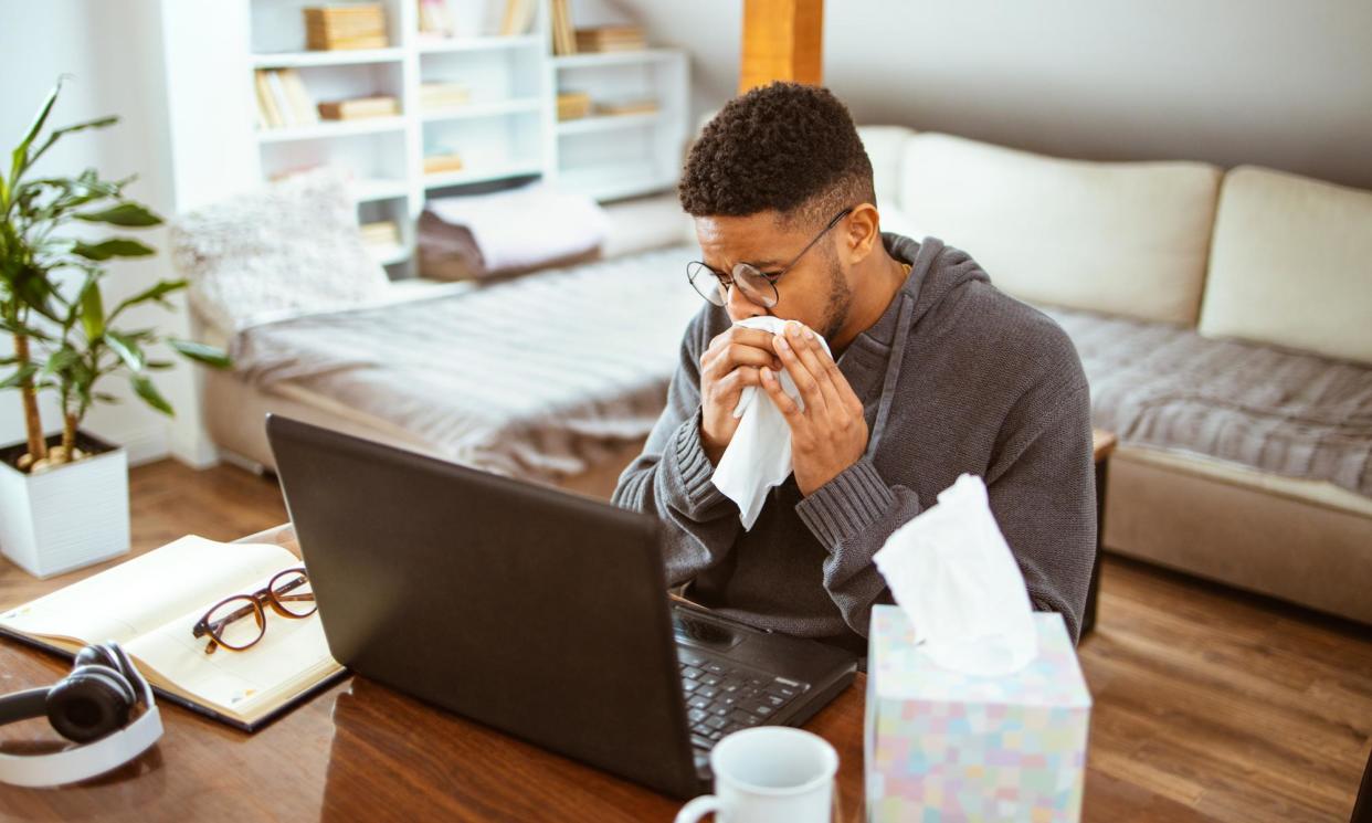 <span>Remote workers are more likely to complete a shift while ill, as there is no danger of them spreading germs in the workplace.</span><span>Photograph: Ika84/Getty Images</span>