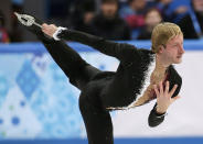 Evgeni Plushenko of Russia competes in the men's team short program figure skating competition at the Iceberg Skating Palace during the 2014 Winter Olympics, Thursday, Feb. 6, 2014, in Sochi, Russia. (AP Photo/Bernat Armangue)