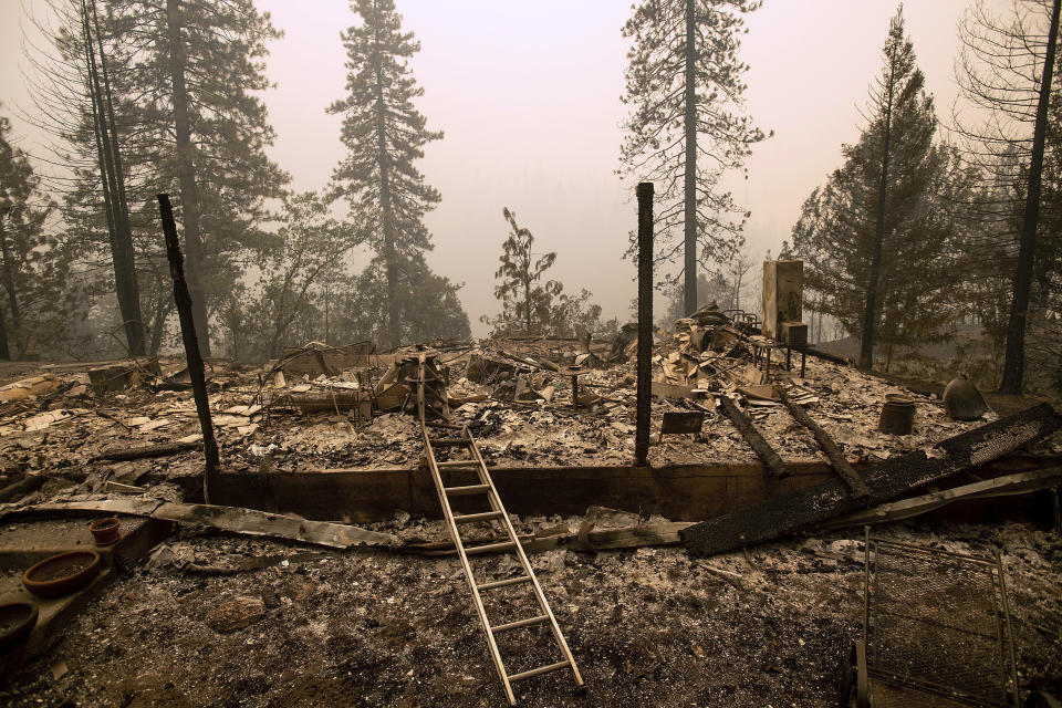 A home leveled by the Delta Fire rests in a clearing in Pollard Flat area of the Shasta-Trinity National Forest, Calif., on Thursday, Sept. 6, 2018. (AP Photo/Noah Berger)