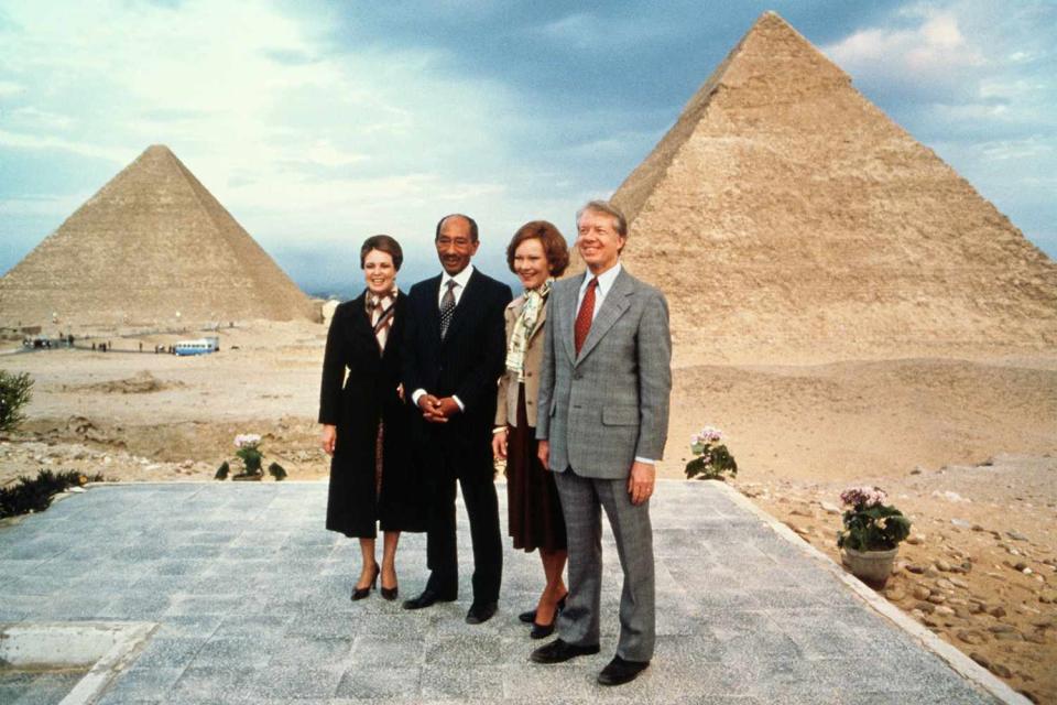 <p>The first lady accompanied her husband on a trip to Egypt in March 1979. Here, the first couple poses with Egyptian President Anwar el-Sadat and his wife Jehan at the famous pyramids of Giza.</p> <p>Six months later, Jimmy would encourage Sadat and Israeli Prime Minister Menachem Begin to sign the Camp David Accords, bringing the countries into a historic peace agreement.</p> <p>During his term as president, Jimmy is also strengthened relations with China and pardoned Vietnam draft evaders.</p>