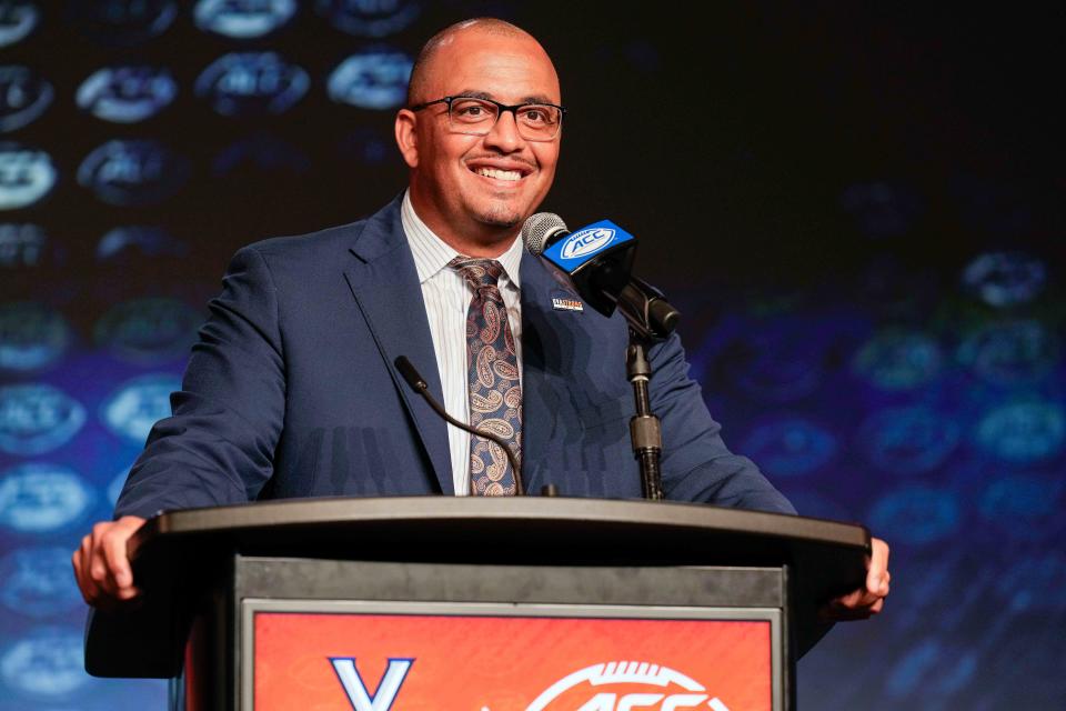 Jul 26, 2023; Charlotte, NC, USA; Virginia head coach Tony Elliott answers questions from the media during the ACC 2023 Kickoff at The Westin Charlotte. Mandatory Credit: Jim Dedmon-USA TODAY Sports