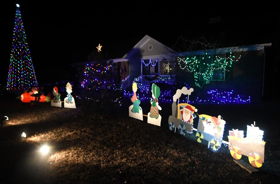 A home on Quail Woods Rd. is decorated for the holidays in Wilmington, N.C., Tuesday, November 30, 2021. Several homes along the street are decorated and the entire street is worth seeing.     MATT BORN/STAR NEWS    