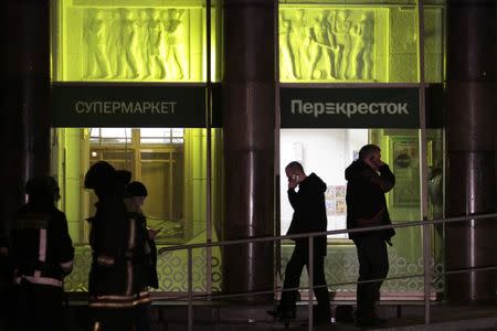 People gather outside a supermarket after an explosion in St Petersburg, Russia December 27, 2017. REUTERS/Anton Vaganov