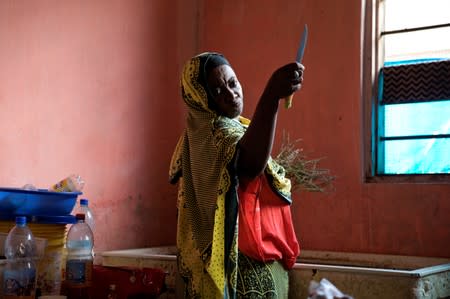 The Wider Image: Tanzania's Zanzibar begins to register traditional healers