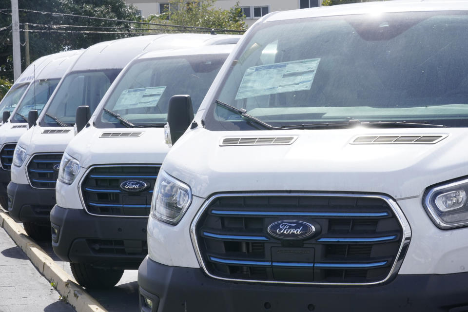 Ford E-Transit vans are displayed at a Gus Machado Ford dealership Monday, Jan. 23, 2023, in Hialeah, Fla. On Tuesday, the Labor Department reports on U.S. consumer prices for January. The consumer price index is closely watched by the Federal Reserve, which has raised interest rates eight times in the past year in an attempt to cool the economy and bring down inflation. (AP Photo/Marta Lavandier)